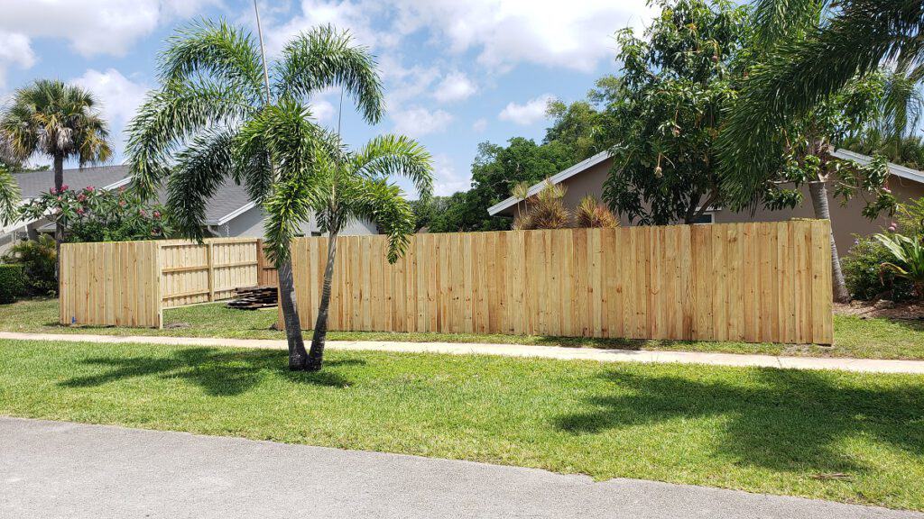 finished installation of wood fencing